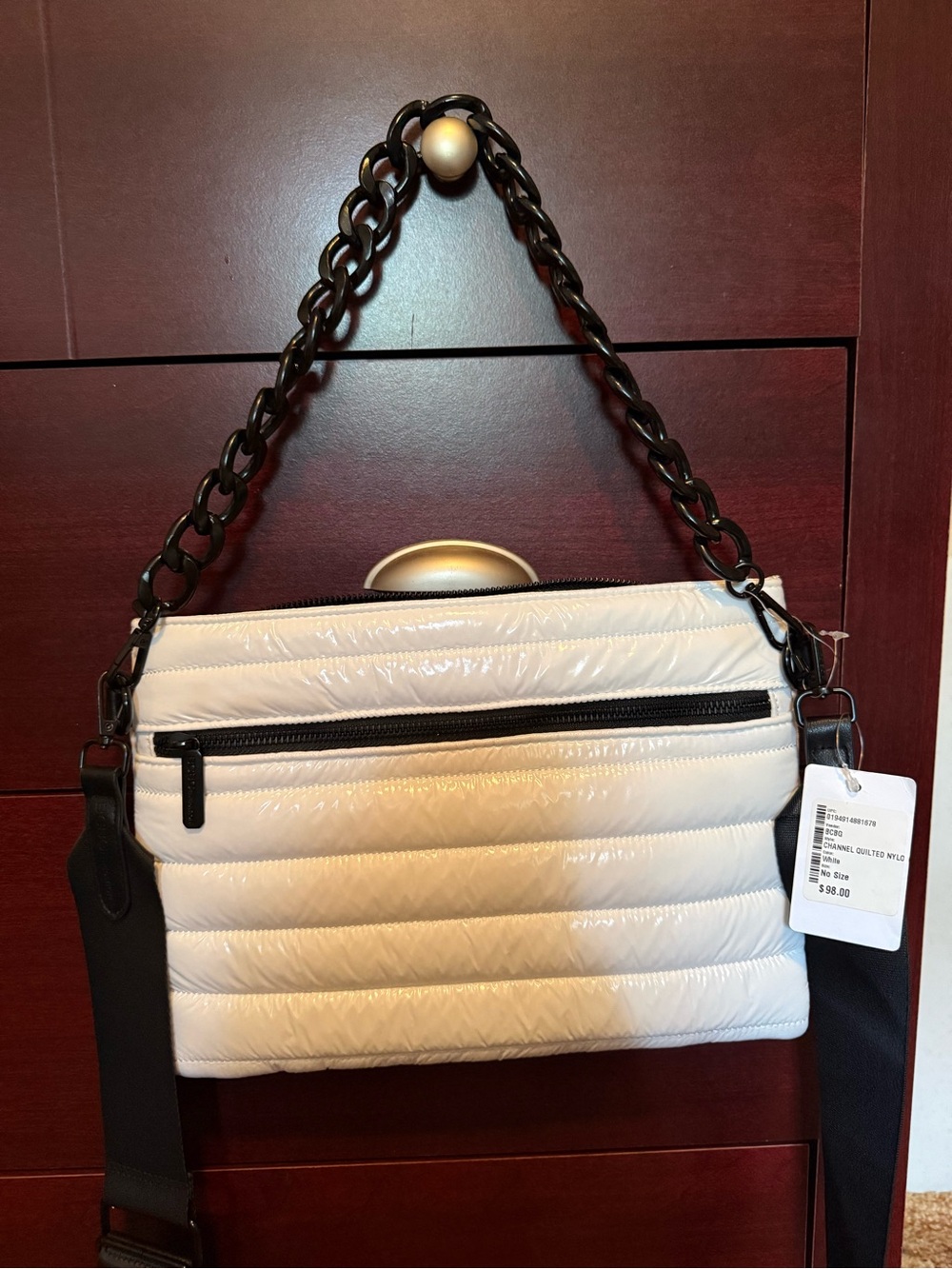 BCB GENERATION White Quilted Crossbody Bag with Black Trim and Chain Strap.